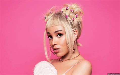 doja cat titty pics|Doja Cat displays the results of her recent breast reduction